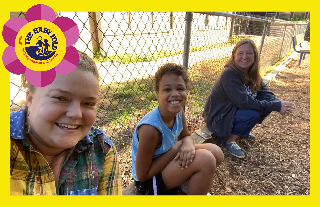 Wear blue this april! Student sitting outside with teacher therapists